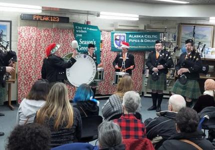 Alaska Celtic Pipe and Drums performs in front of a crowd