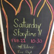 chalk board advertising saturday storytime with a fire fighter