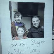 A poster with a photo of a police officer and two young boys, "Saturday Storytime at the Palmer Library"