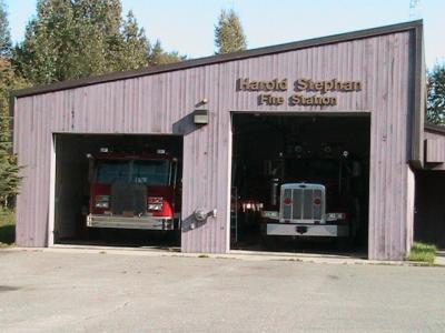 Fire Station with two trucks in the garage bays