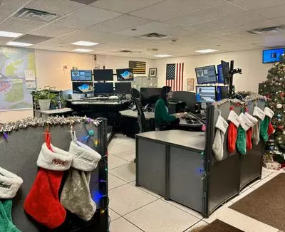 dispatch center with Anna in frame